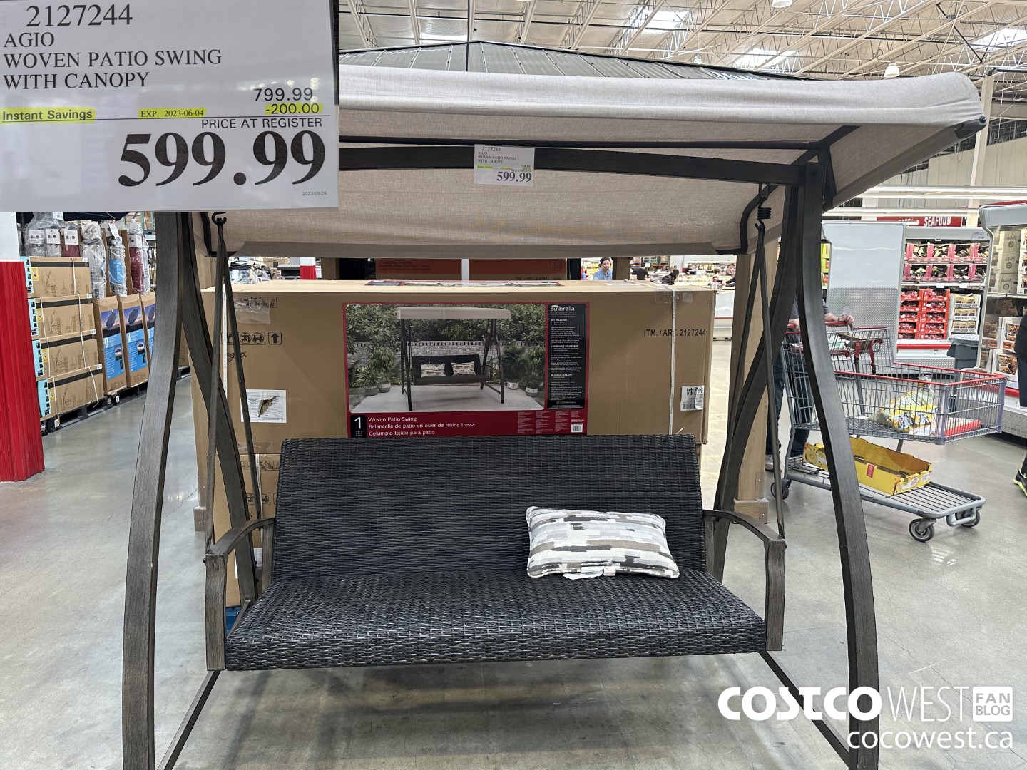 2127244 AGIO WOVEN PATIO SWING WITH CANOPY ($200.00 INSTANT SAVINGS EXPIRES ON 2023-06-04) $599.99