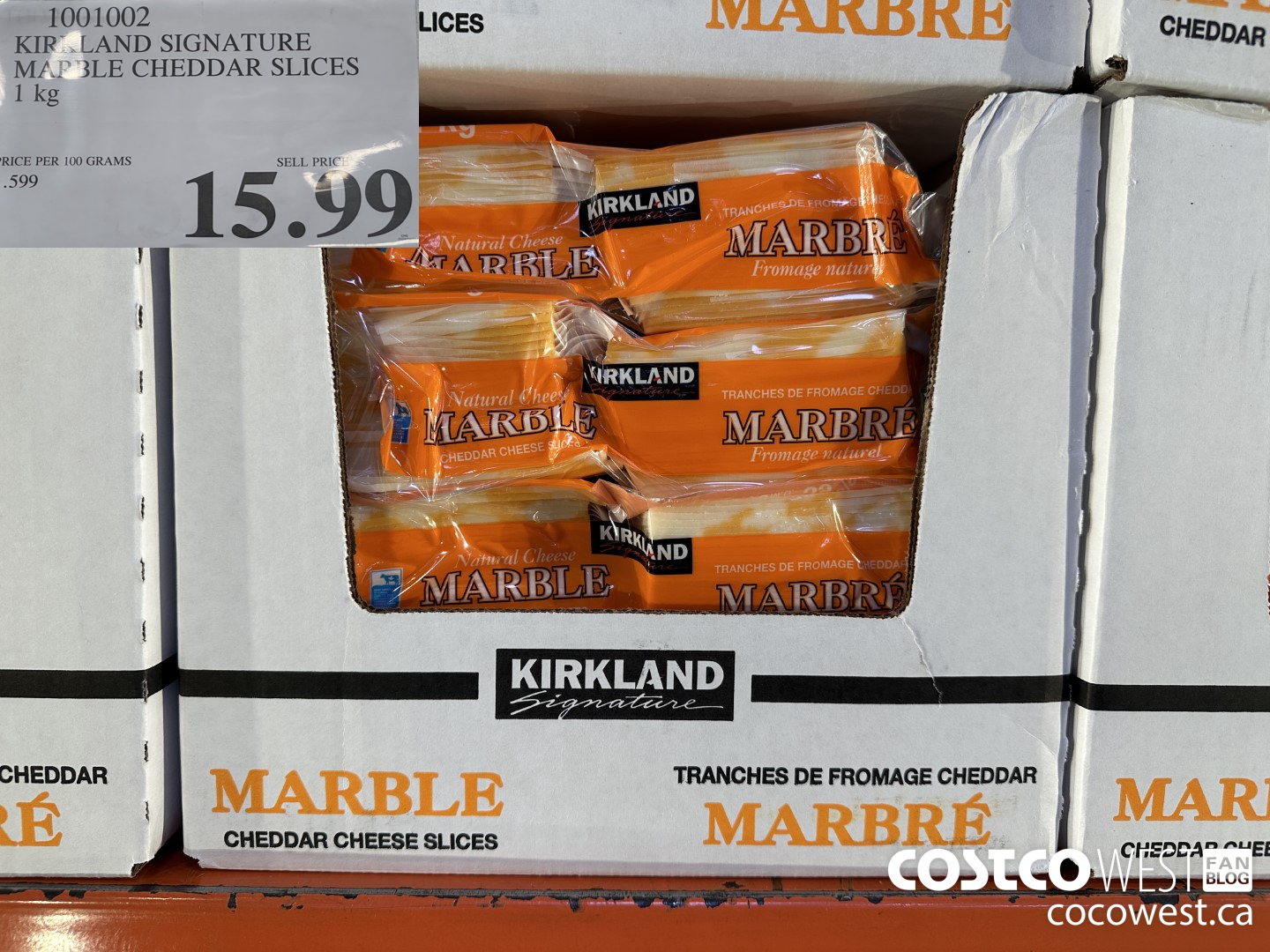 1001002 KIRKLAND SIGNATURE MARBLE CHEDDAR SLICES 1KG $15.99