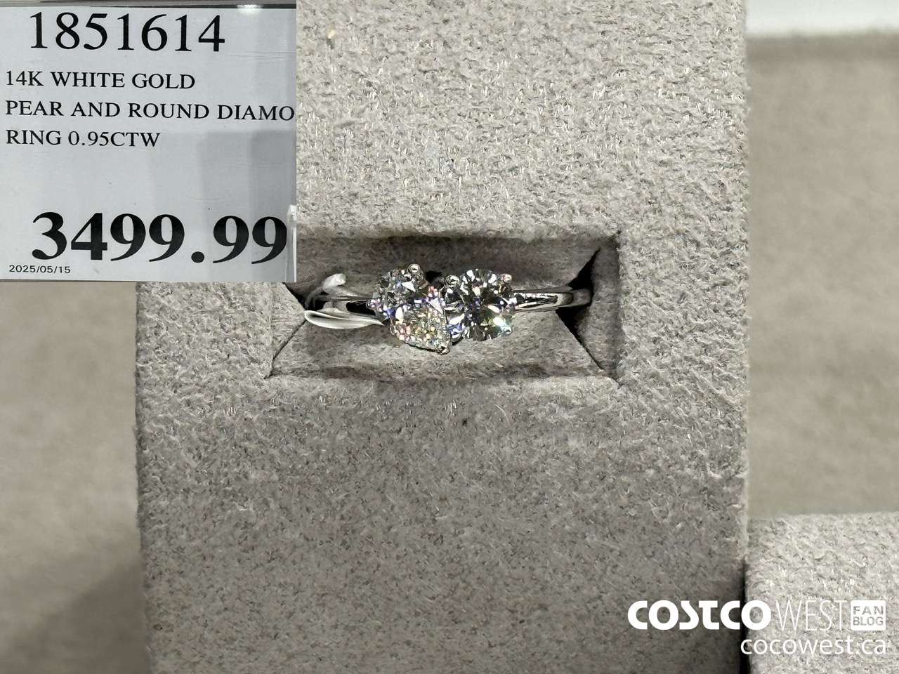 1851614 14KT WHITE GOLD PEAR AND ROUND DIAMOND RING 0.95CTW $3499.99