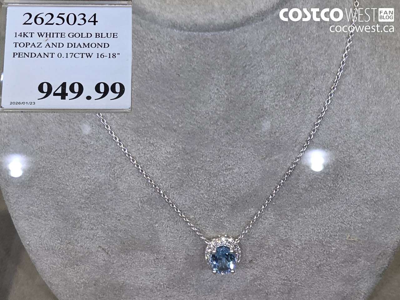 2625034 14KT WHITE GOLD BLUE TOPAZ AND DIAMOND PENDANT 0.17CTW 16-18