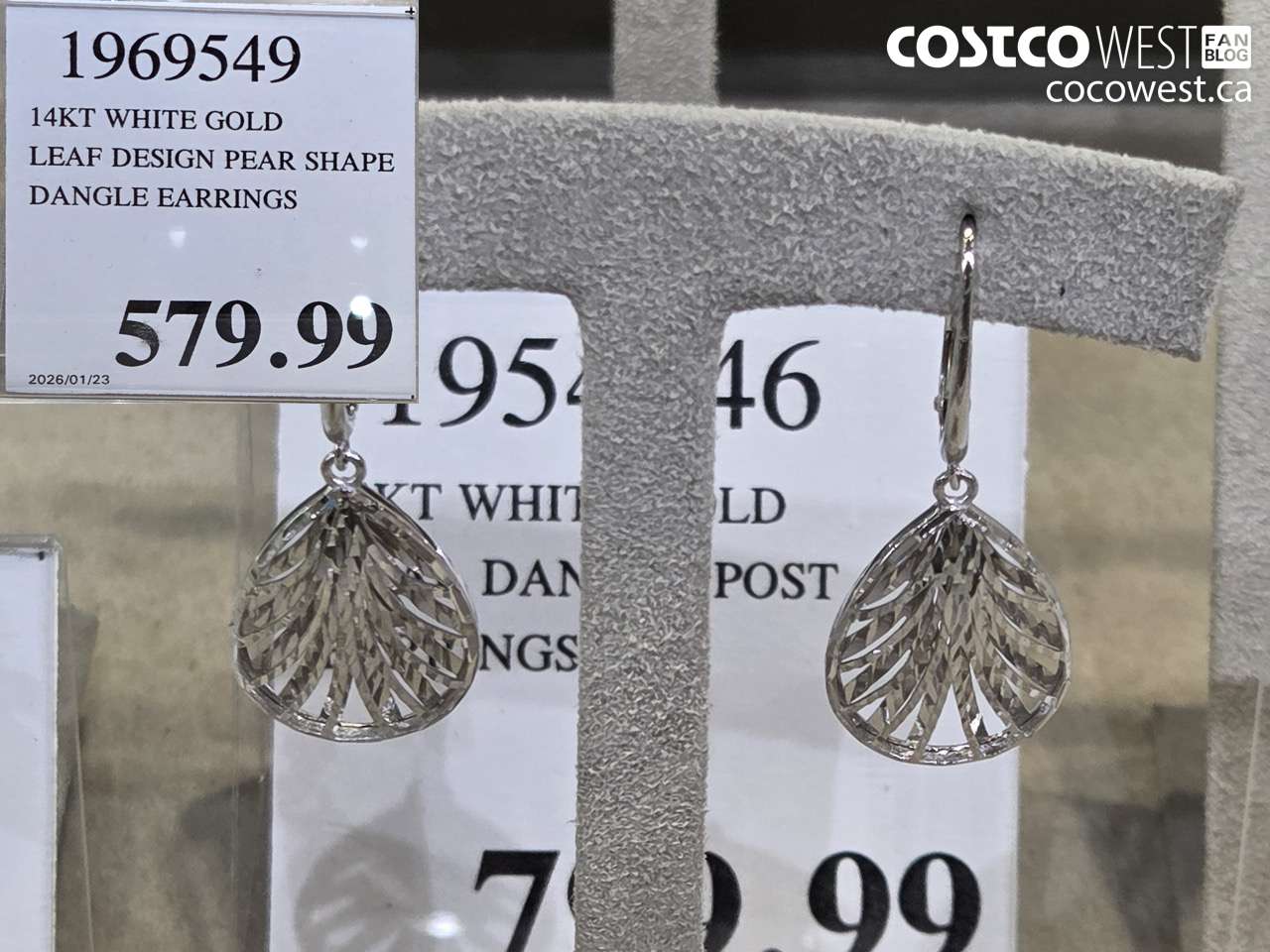 1969549 14KT WHITE GOLD LEAF DESIGN PEAR SHAPE DANGLE EARRINGS $579.99