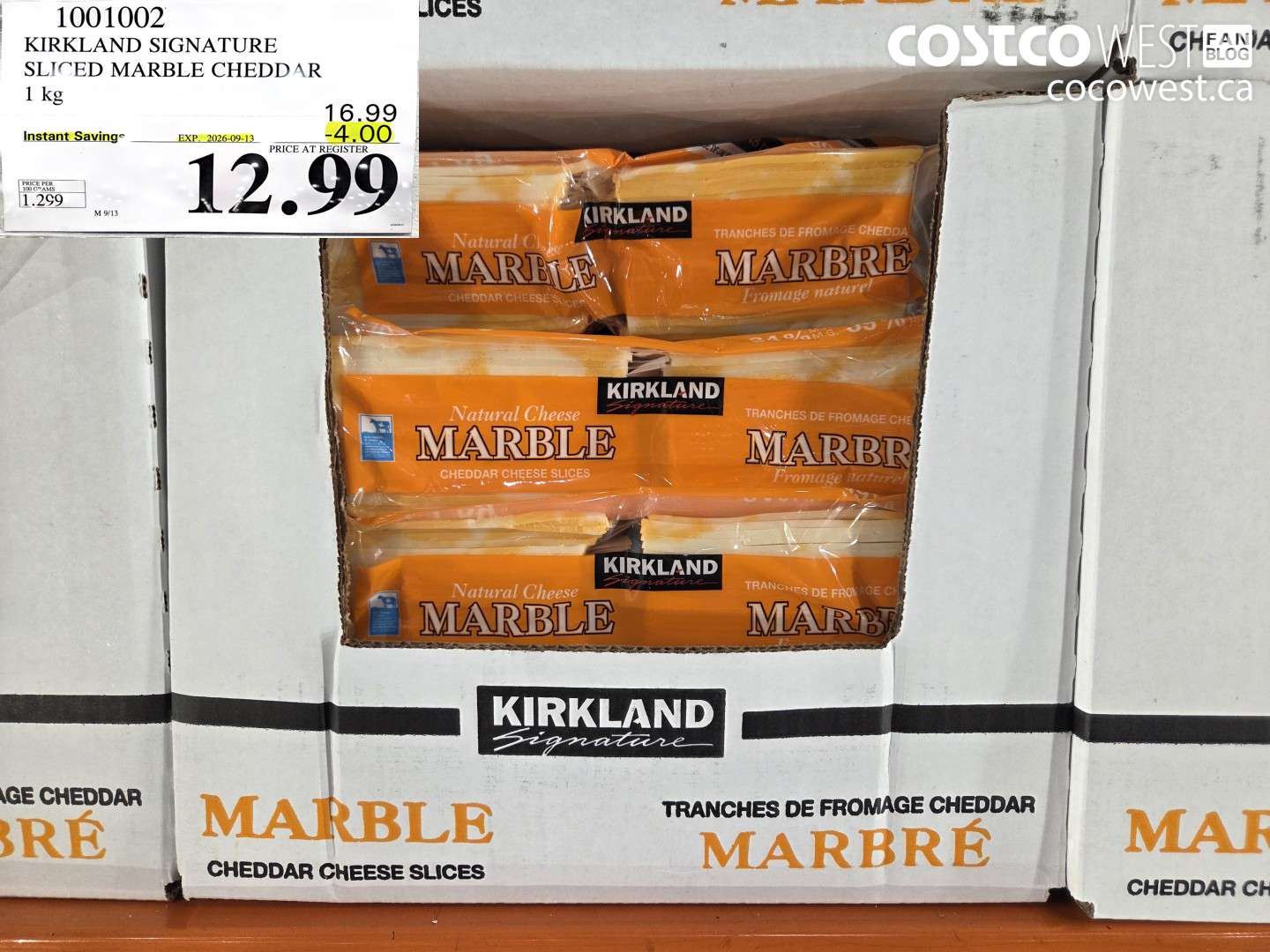 1001002 KIRKLAND SIGNATURE SLICED MARBLE CHEDDAR 1 KG ($4.00 INSTANT SAVINGS EXPIRES ON 2026-09-13) $12.99